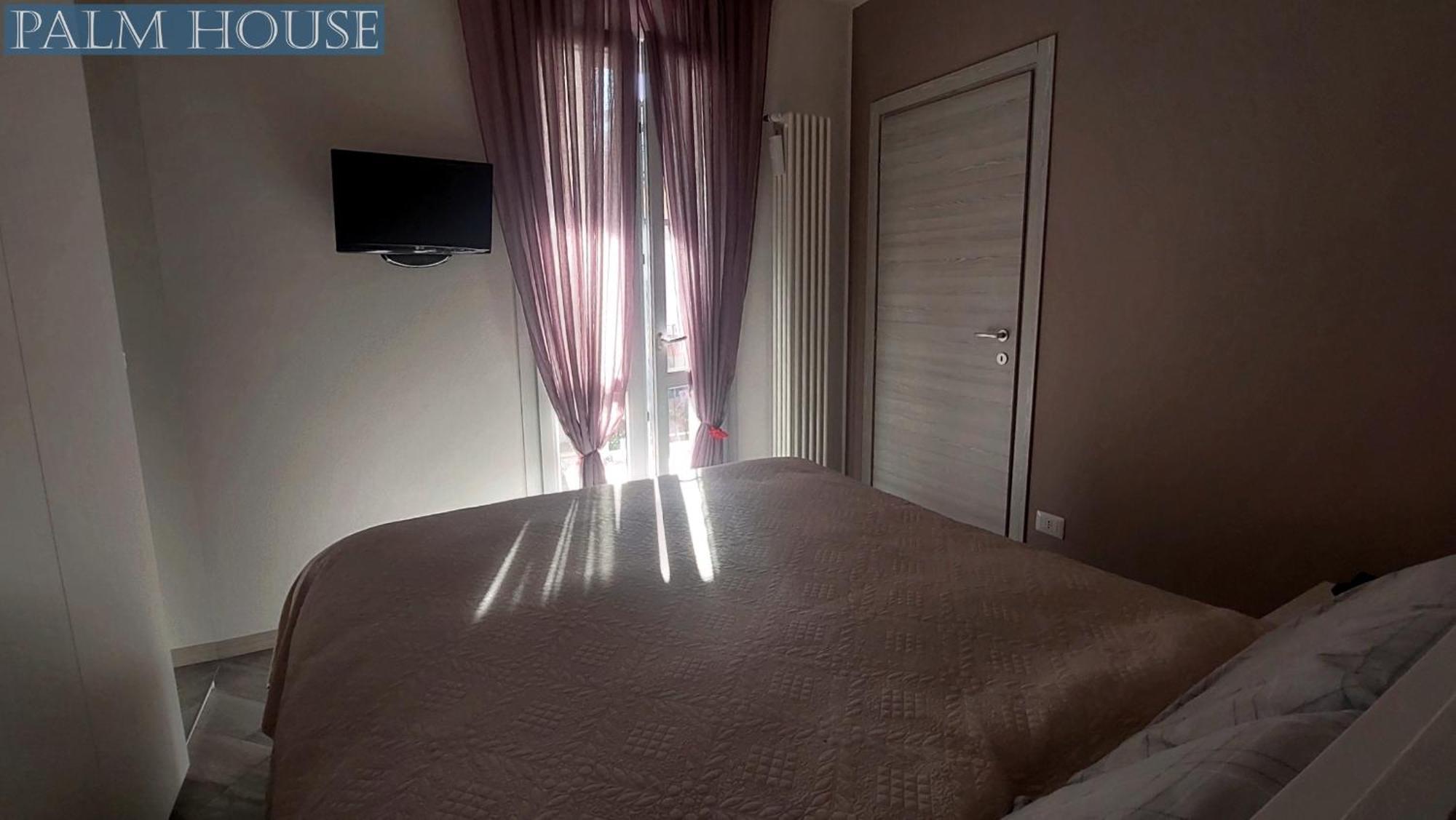 Palm House Apartment Brusimpiano ภายนอก รูปภาพ
