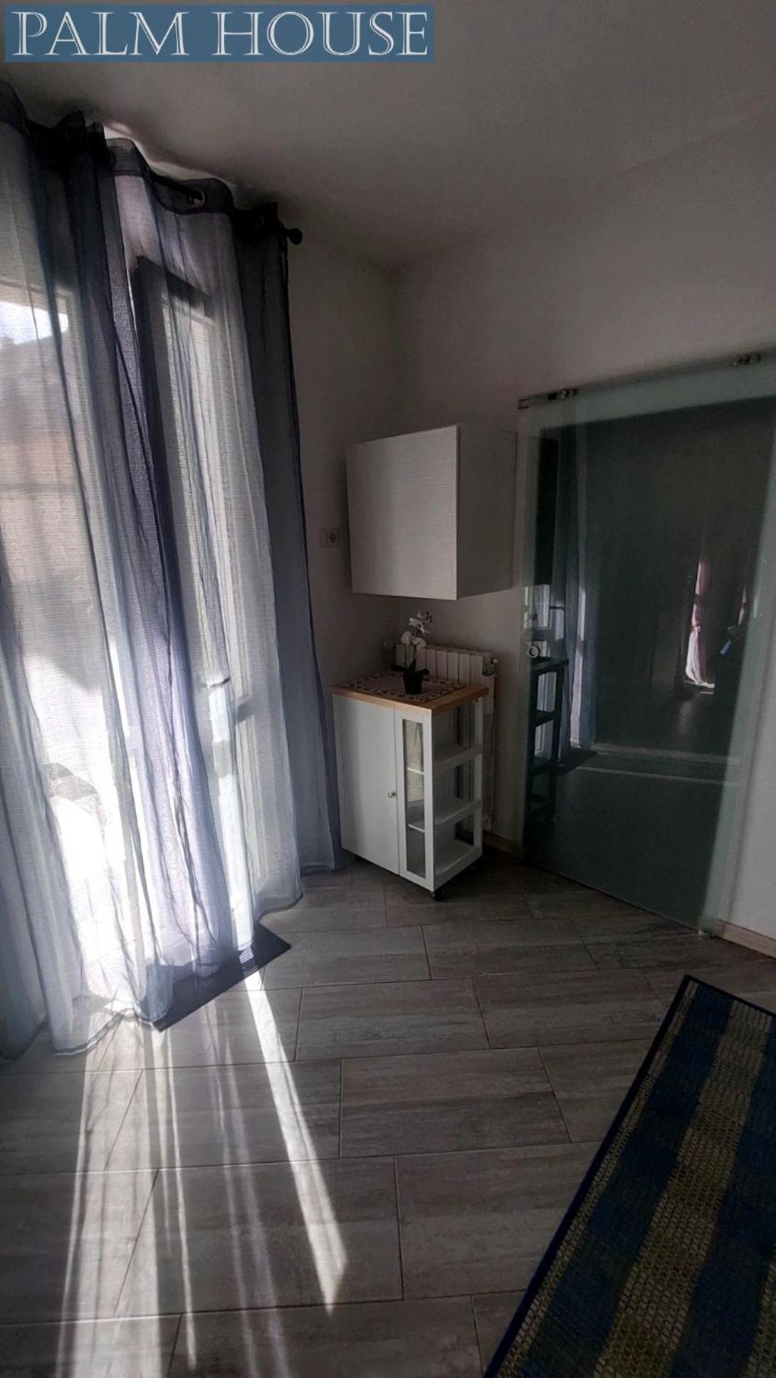 Palm House Apartment Brusimpiano ภายนอก รูปภาพ