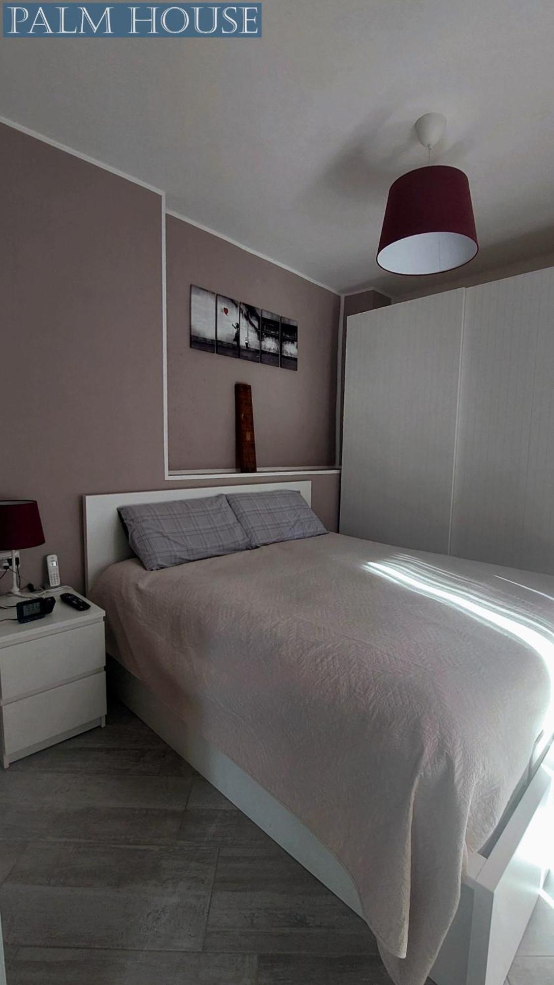 Palm House Apartment Brusimpiano ภายนอก รูปภาพ