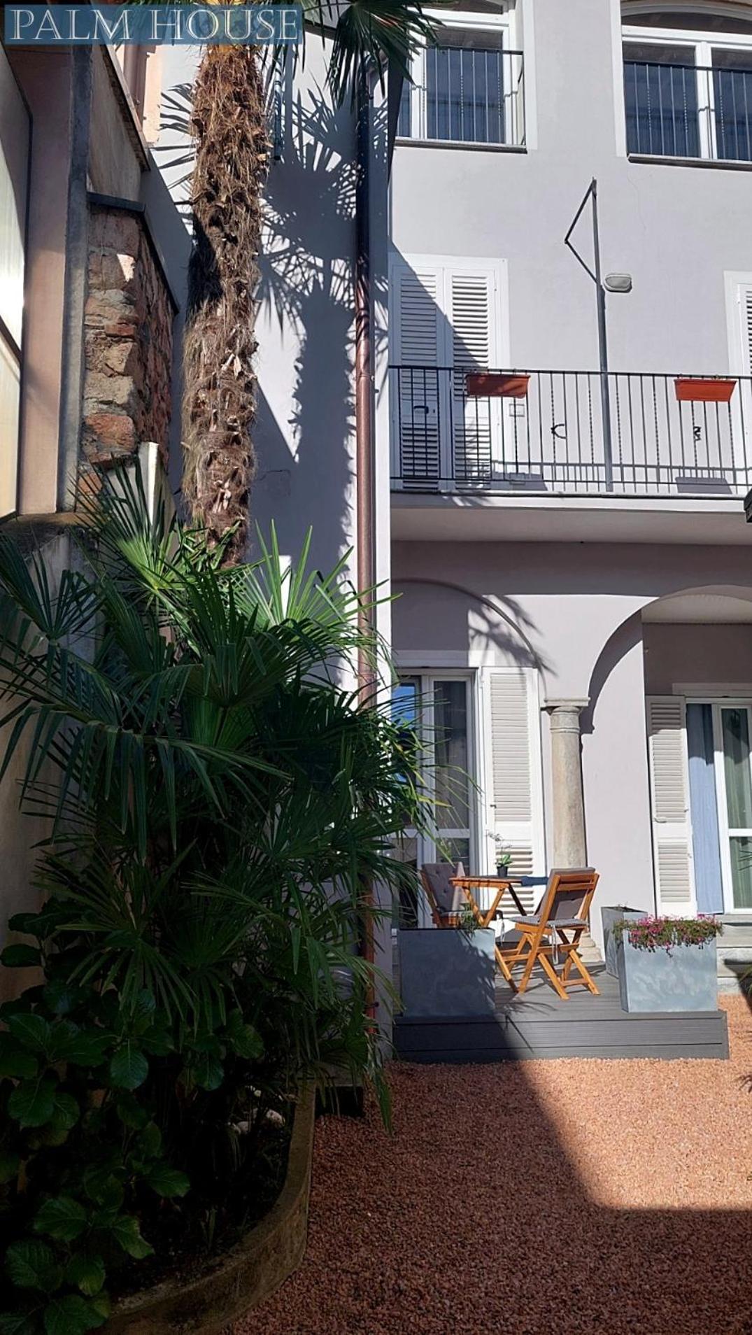 Palm House Apartment Brusimpiano ภายนอก รูปภาพ