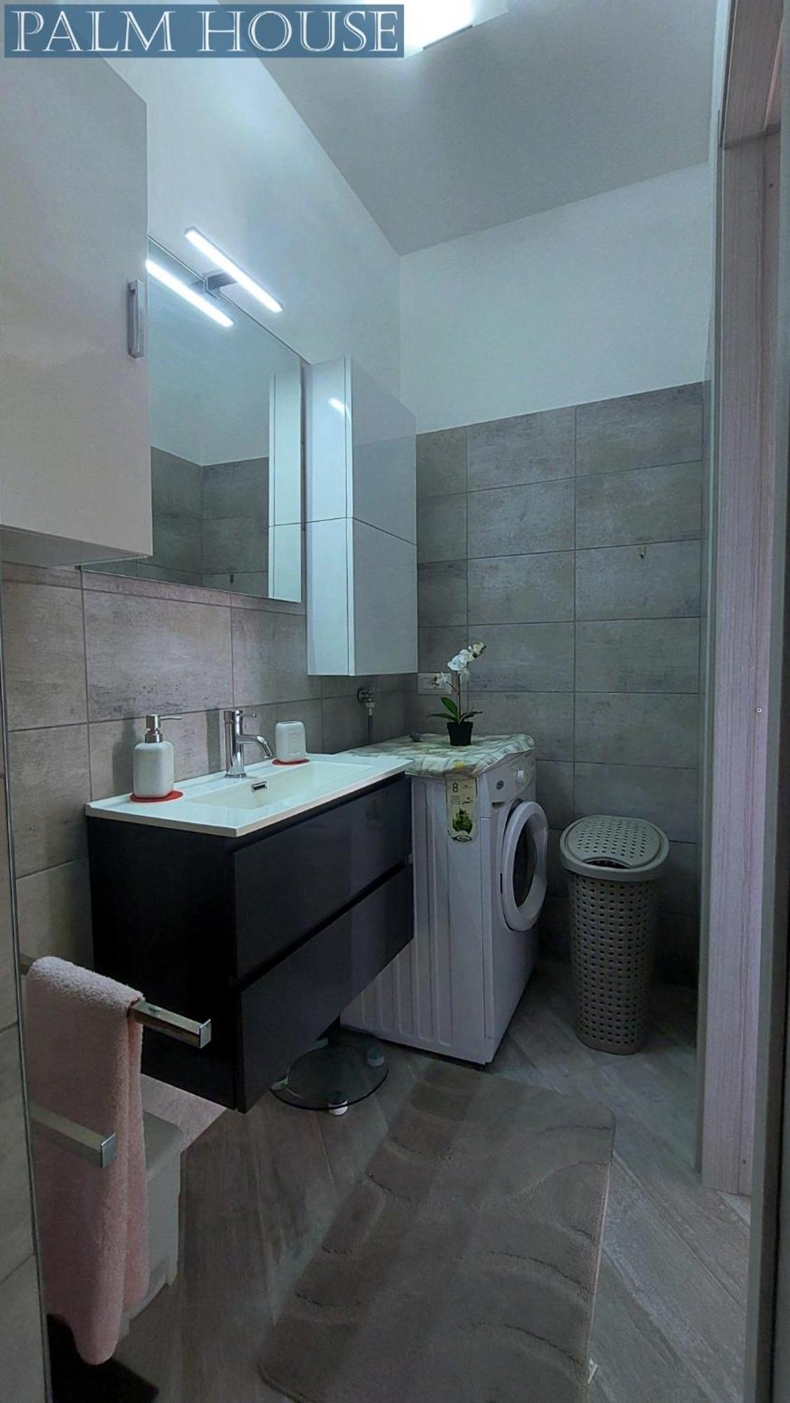 Palm House Apartment Brusimpiano ภายนอก รูปภาพ