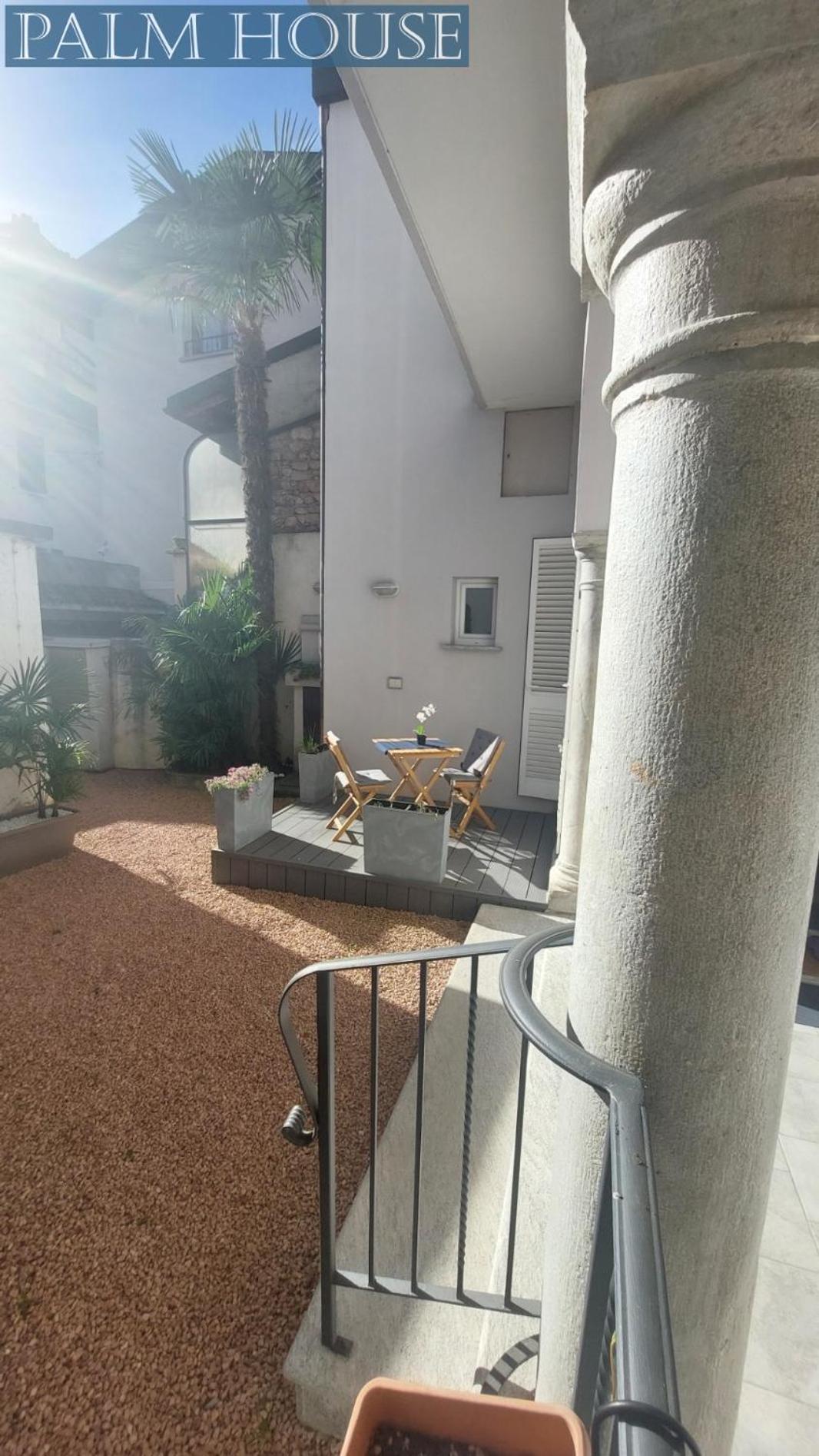 Palm House Apartment Brusimpiano ภายนอก รูปภาพ